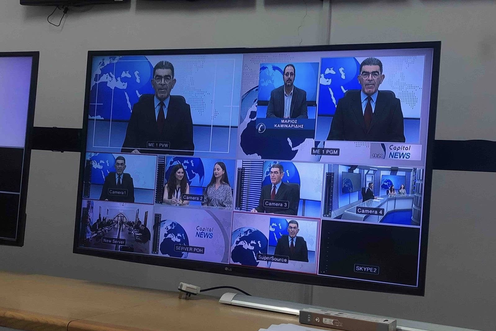 Television screen showing the report about the Incubation Programme winers
