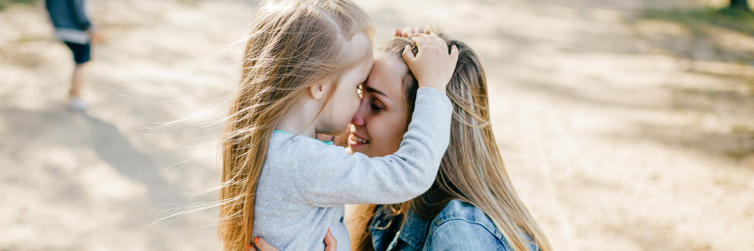 Mother hugging her child