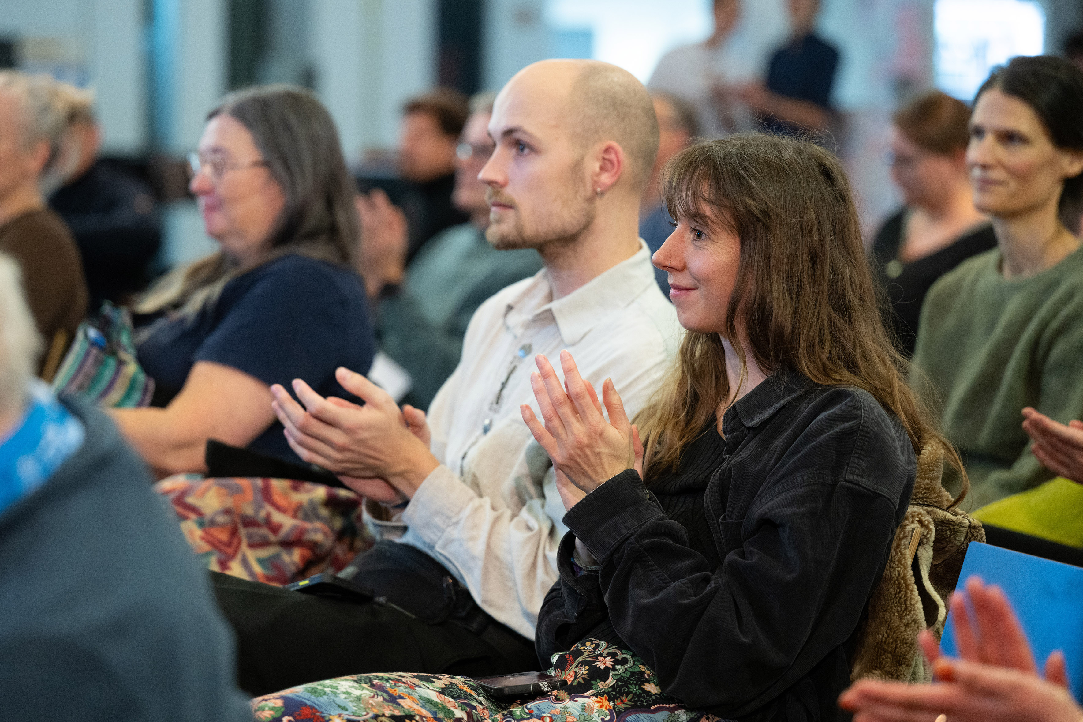 View of the approximately 70 guests in the foyer of the Design Department