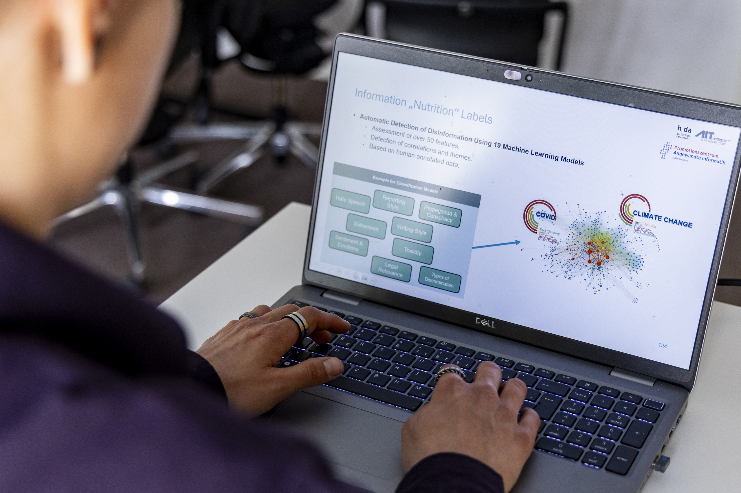 A laptop screen displaying graphics from the DisDETECT analysis tool, viewed over Mina Schütz’s shoulder