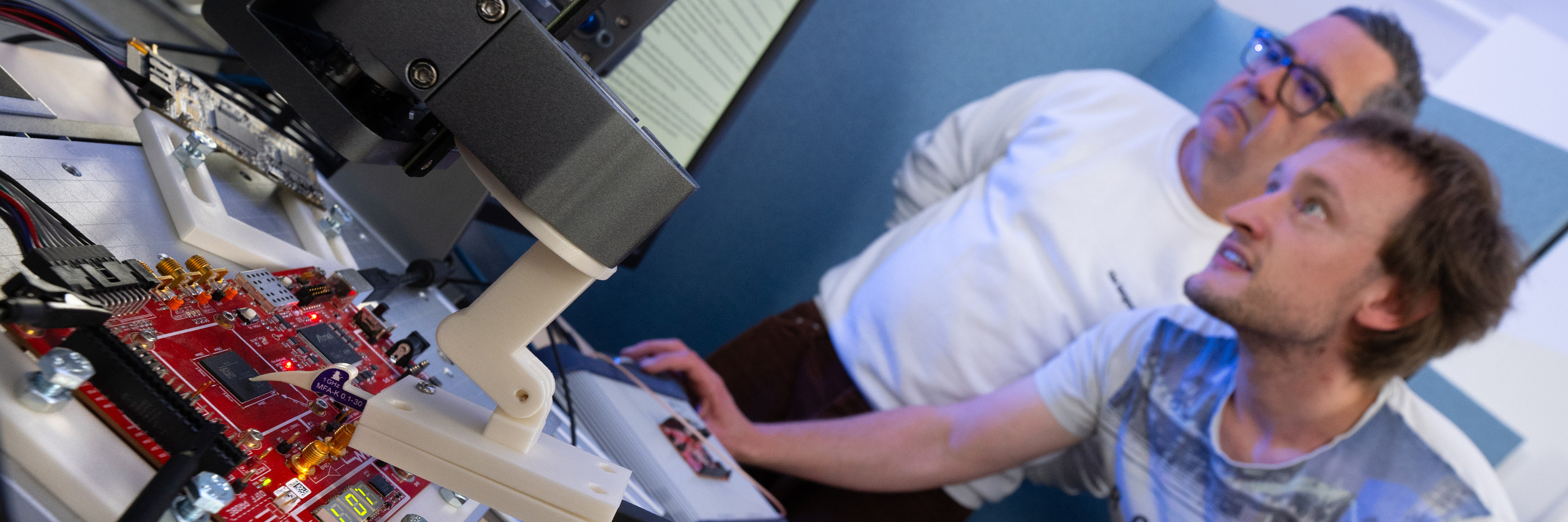 Team at work in a lab with computers