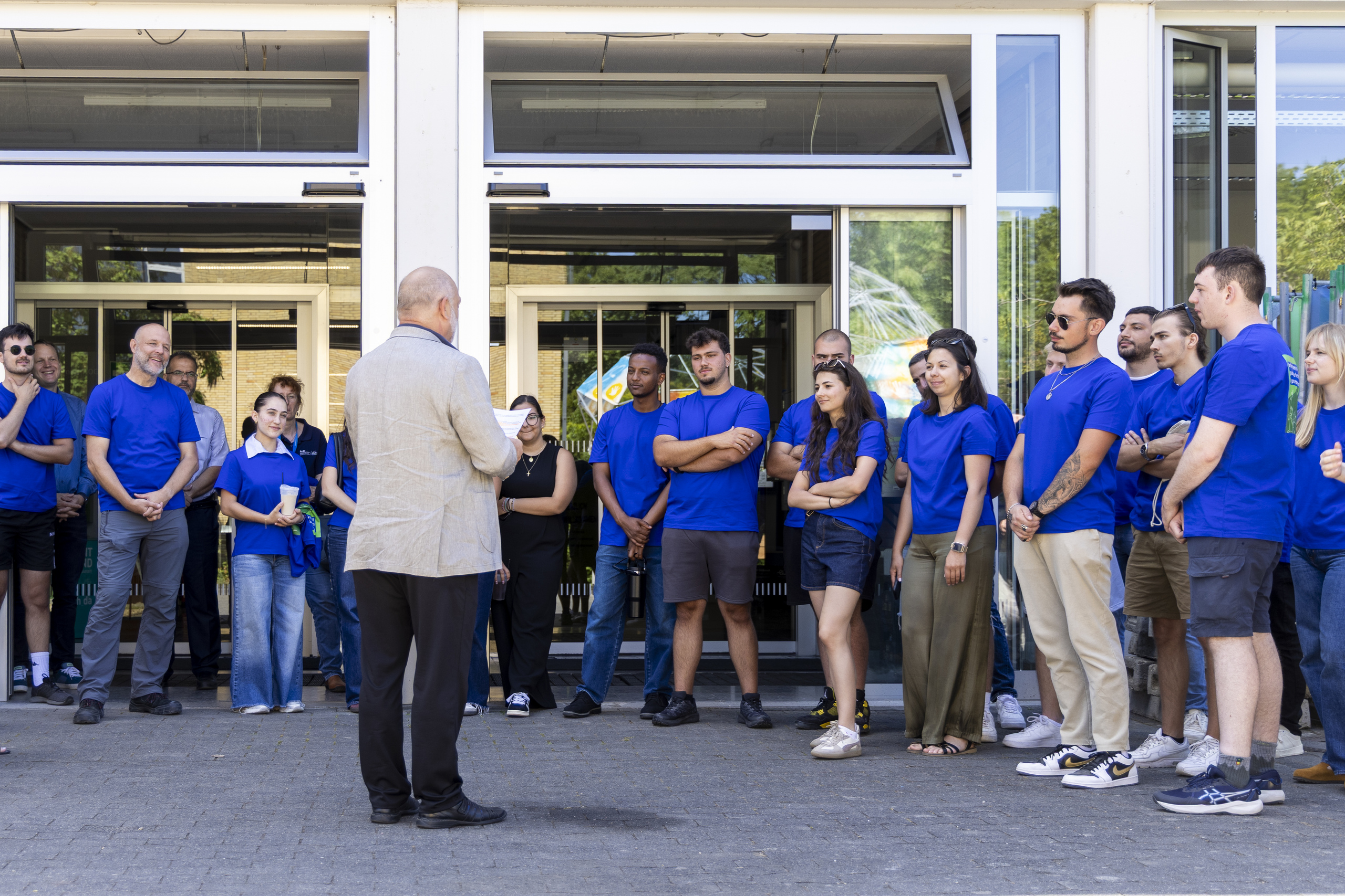 President Steinmetz speaking to a group of students