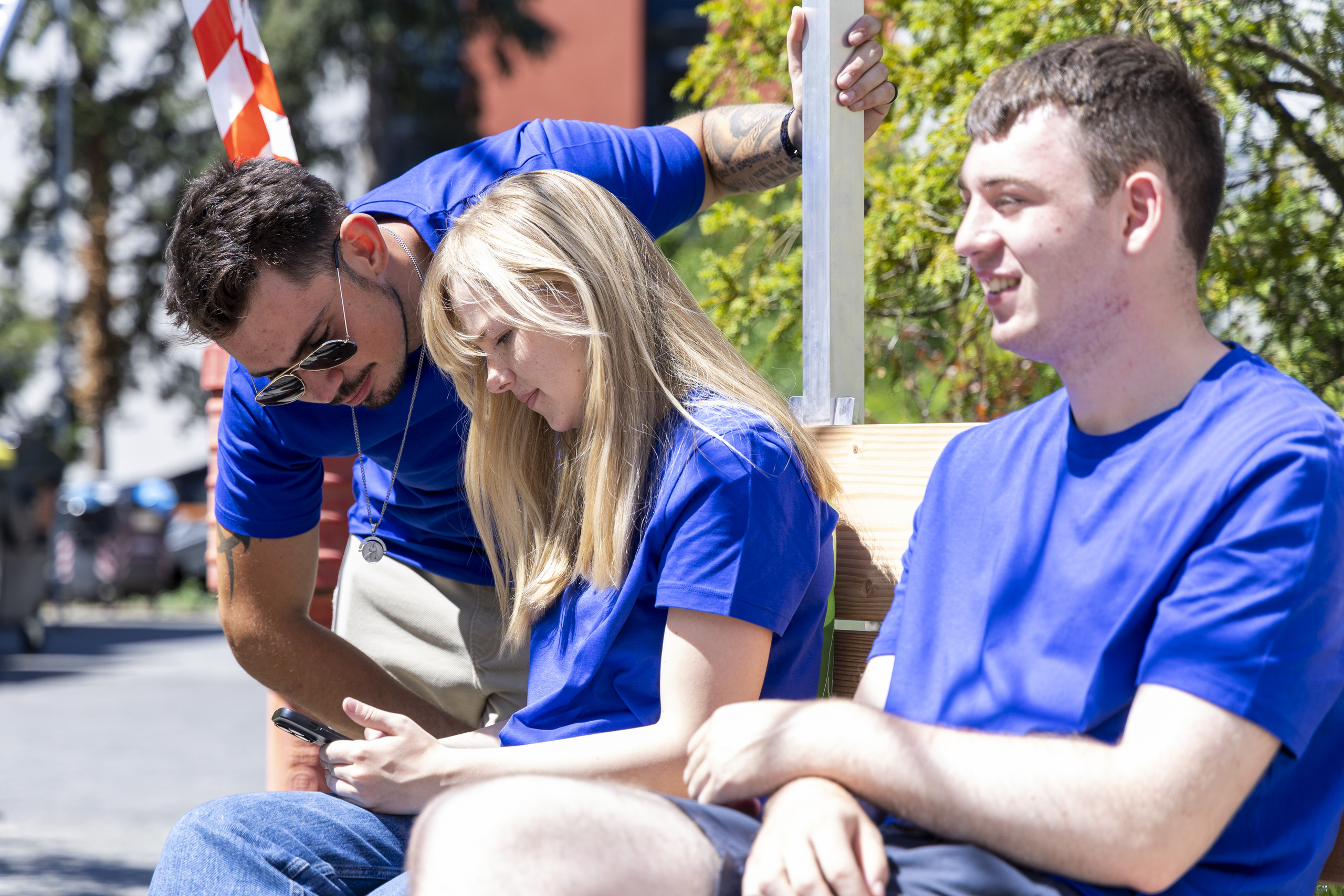 Three students discussing something